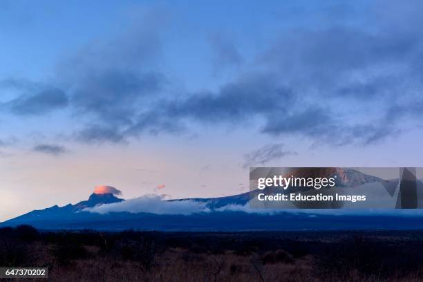 Mt Kilimanjaro and Mt Mawenzi, in Tanzania, on the left from Satao Elerai Conservancy, Near Amboseli National Park, Kenya.