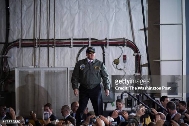 President Donald Trump arrives to speak to Navy and shipyard personnel aboard nuclear aircraft carrier Gerald R. Ford at Newport News Shipbuilding in...