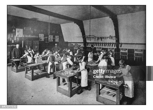 stockillustraties, clipart, cartoons en iconen met antieke londense foto's: board school timmerwerk klasse - 1900 london