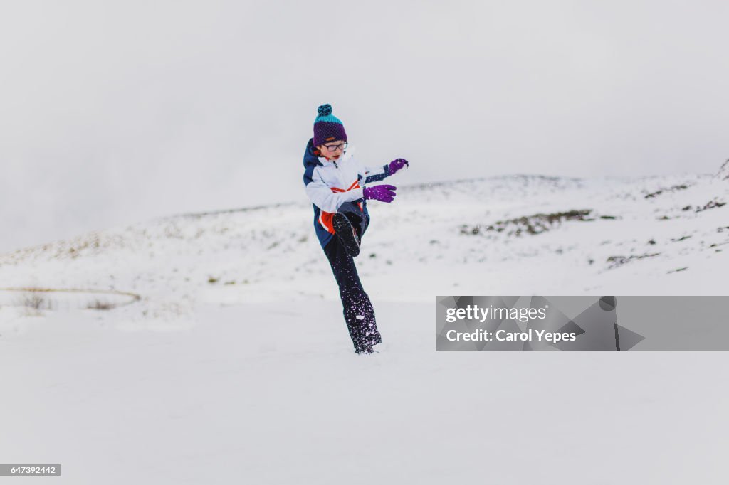 Boy playing snow