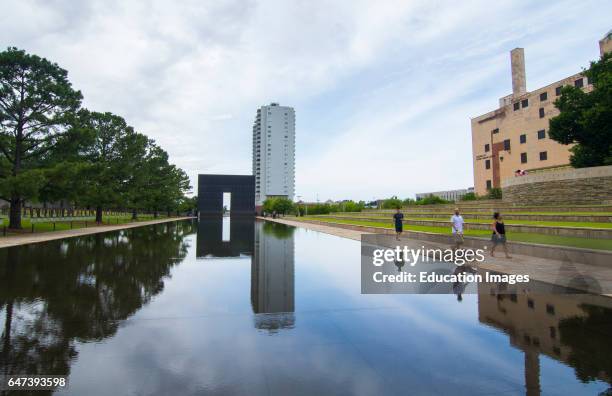 Oklahoma City Oklahoma OK, OKC, historical disaster OKC bombing reflection lake at OKC Bombing Memorial that happened on April 19, 1995.