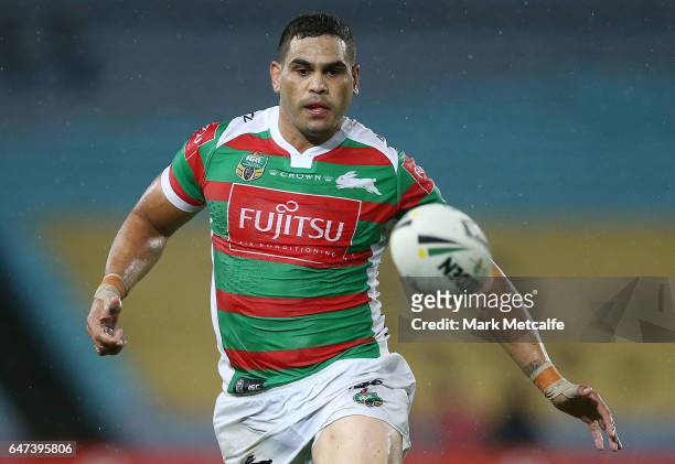 Greg Inglis of the Rabbitohs watches the ball before scoring a try during the round one NRL match between the South Sydney Rabbitohs and the Wests...