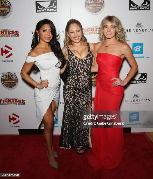 Invicta ring girls Jessica Mao, Jade Bryce and Natasha Kingsbury attend the ninth annual Fighters Only World Mixed Martial Arts Awards at The Palazzo...