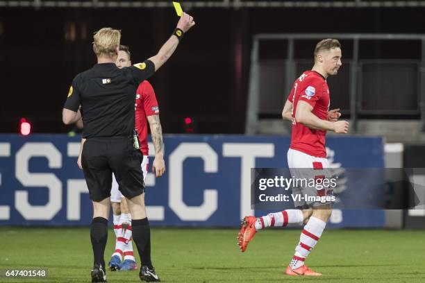 Referee Kevin Blom give a yellow card to Rens van Eijden of AZ Alkmaarduring the Dutch Cup semi final match between AZ Alkmaar and sc Cambuur...