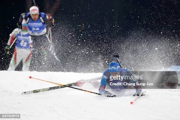 Yury Shopin of Russia falls in the Men 10km Sprint during the BMW IBU World Cup Biathlon 2017 - test event for PyeongChang 2018 Winter Olympic Games...