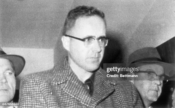 Joseph Corbett, Jr., turns his head aside as he is taken to U.S. Marshall’s office after waiving all legal barriers to his extradition to Colorado...