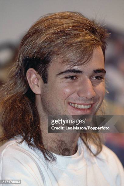 American tennis player Andre Agassi pictured sporting his distinctive mullet hairstyle at a press conference in the United States in January 1989.