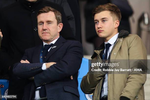 Dean Hoyle chairman of Huddersfield Town and his son Danny Hoyle during The Emirates FA Cup Fifth Round Replay between Manchester City and...