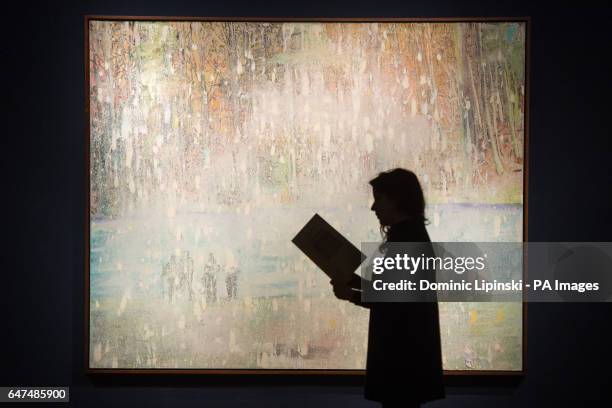 Visitor looks at Cobourg 3+1 by Peter Doig which is estimated to fetch &Acirc;&pound;8 000-&Acirc;&pound;12 000 during their Post-War and...
