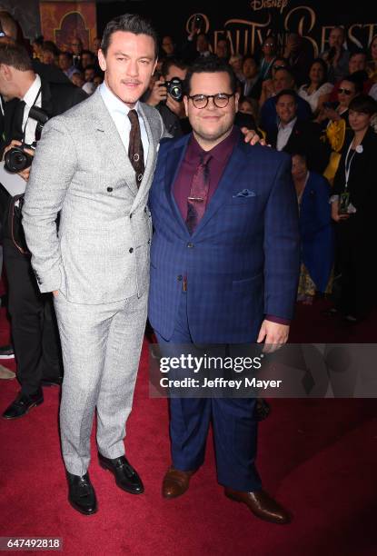 Actors Luke Evans and Josh Gad arrive at the Premiere Of Disney's 'Beauty And The Beast' at the El Capitan Theatre on March 2, 2017 in Los Angeles,...