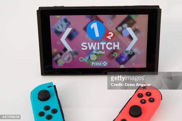 The new Nintendo Switch game console is displayed at a pop-up Nintendo venue in Madison Square Park, March 3, 2017 in New York City. The Nintendo...