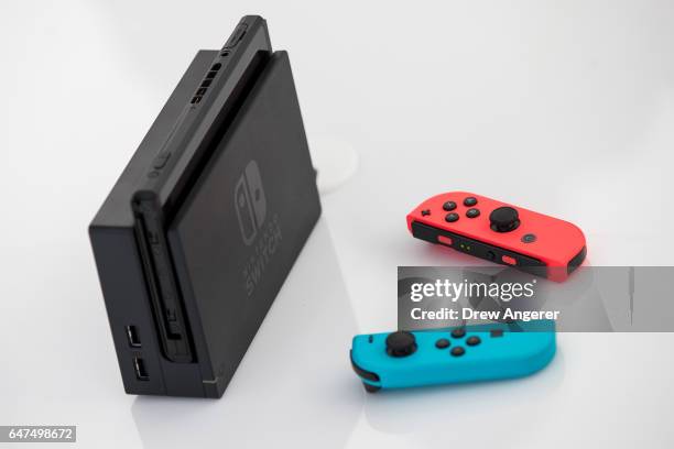 The new Nintendo Switch game console is displayed at a pop-up Nintendo venue in Madison Square Park, March 3, 2017 in New York City. The Nintendo...