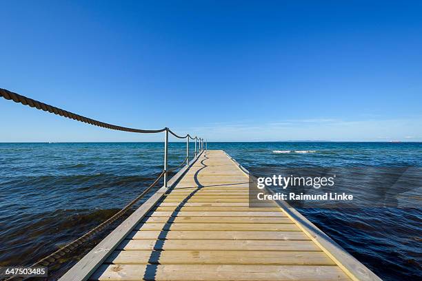 wooden jetty on beach - kattegat stock pictures, royalty-free photos & images