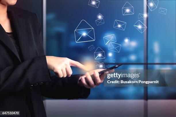 business woman are sending email marketing by digital smart phone - finger dialing touch tone telephone stock pictures, royalty-free photos & images