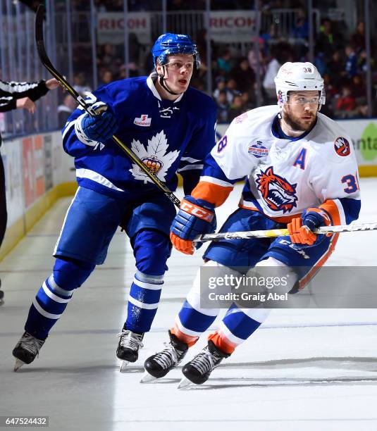 Bracken Kearns of the Bridgeport Sound Tigers turns up ice with Kasperi Kapanen of the Toronto Marlies during AHL game action on March 2, 2017 at...