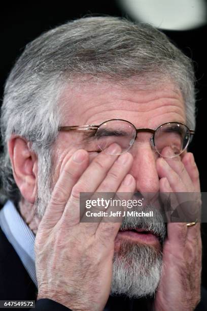 Sinn Fein President Gerry Adams gives television interview at a count for the Northern Ireland assembly election on March 3, 2017 in Belfast,...