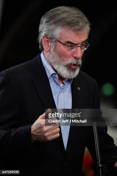 Sinn Fein President Gerry Adams gives television interview at a count for the Northern Ireland assembly election on March 3, 2017 in Belfast,...