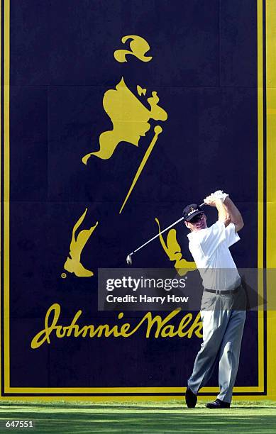 Nick Faldo of England hits a tee shot on the par-4 16th hole during the first round of the Johnnie Walker Classic at the Alpine Golf and Sports Club...