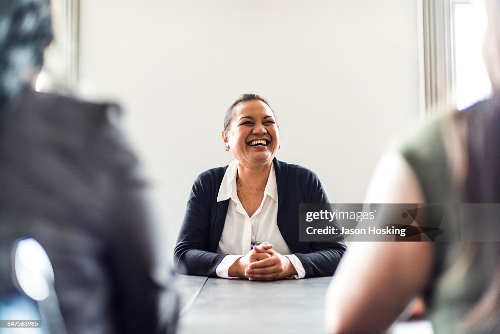 Three businesswomen in conference room