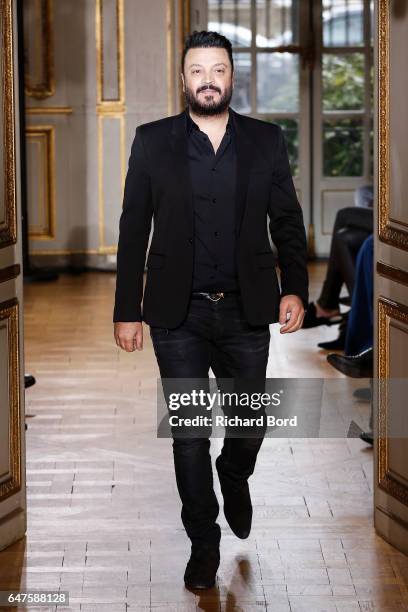 Designer Zuhair Murad walks the runway during the Zuhair Murad show as part of the Paris Fashion Week Womenswear Fall/Winter 2017/2018 on March 3,...
