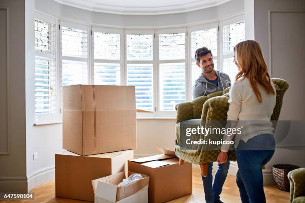 where is this going to go? - moving furniture stock pictures, royalty-free photos & images