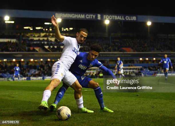 Kemar Roofe of Leeds United battles with Josh Dacres-Cogley of Birmingham City during the Sky Bet Championship match between Birmingham City and...