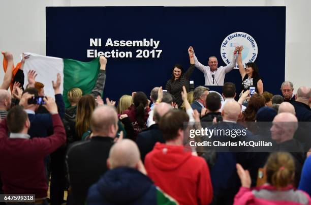 Sinn Fein's Michelle Gildernew , Sean Lynch and Jemma Dolan celebrate winning their three seats in the Fermanagh South Tyrone election as the...
