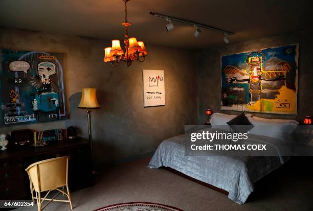 General view shows a room at street artist Banksy's newly opened Walled Off hotel in the Israeli occupied West Bank town of Bethlehem, on March 3,...