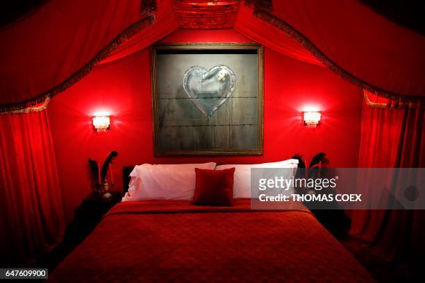 General view shows the presidential suite at street artist Banksy's newly opened Walled Off hotel in the Israeli occupied West Bank town of...