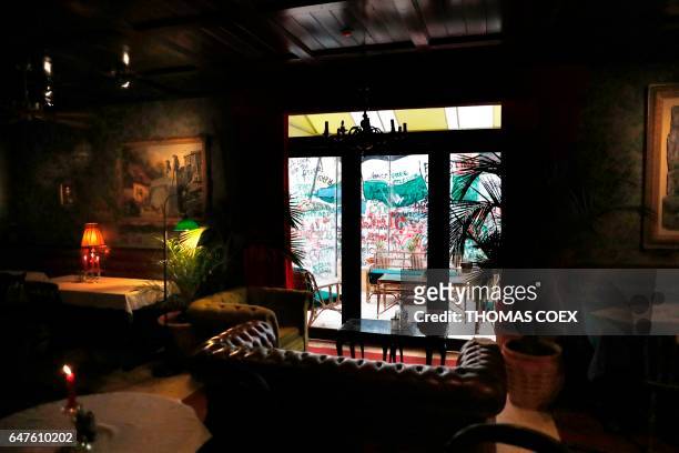 General view shows the lobby at street artist Banksy's newly opened Walled Off hotel in the Israeli occupied West Bank town of Bethlehem, on March 3,...