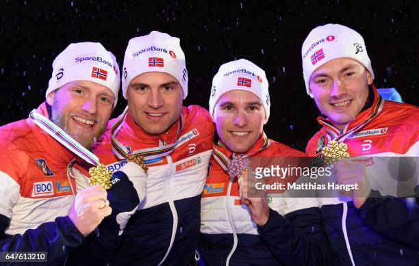 Finn Haagen Krogh, Didrik Toenseth, Niklas Dyrhaug and Martin Johnsrud Sundby of Norway celebrate winning the gold medal for the Men's 4x10km Cross...