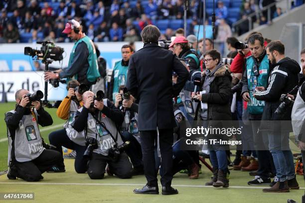 Dietmar Beiersdorfer of Hamburg looks on during the Bundesliga match between TSG 1899 Hoffenheim and Hamburger SV at Wirsol Rhein-Neckar-Arena on...