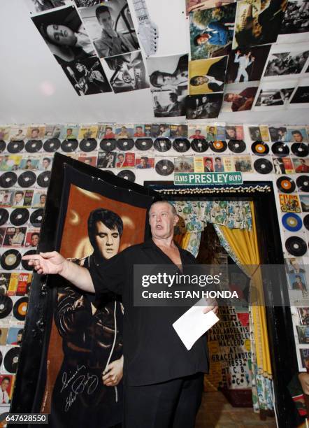 Elvis Presley fan Paul MacLeod gives a tour of his vast collection of Presley related items, 17 August 2007, at his home which he calls "Graceland...