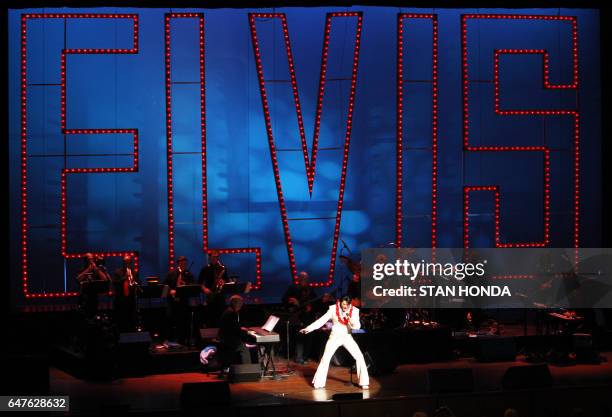 Trent Carlini of Longview, Texas performs on stage in The Ultimate Elvis Tribute Artist Contest, 17 August 2007 in Memphis, Tennessee. Fans from...