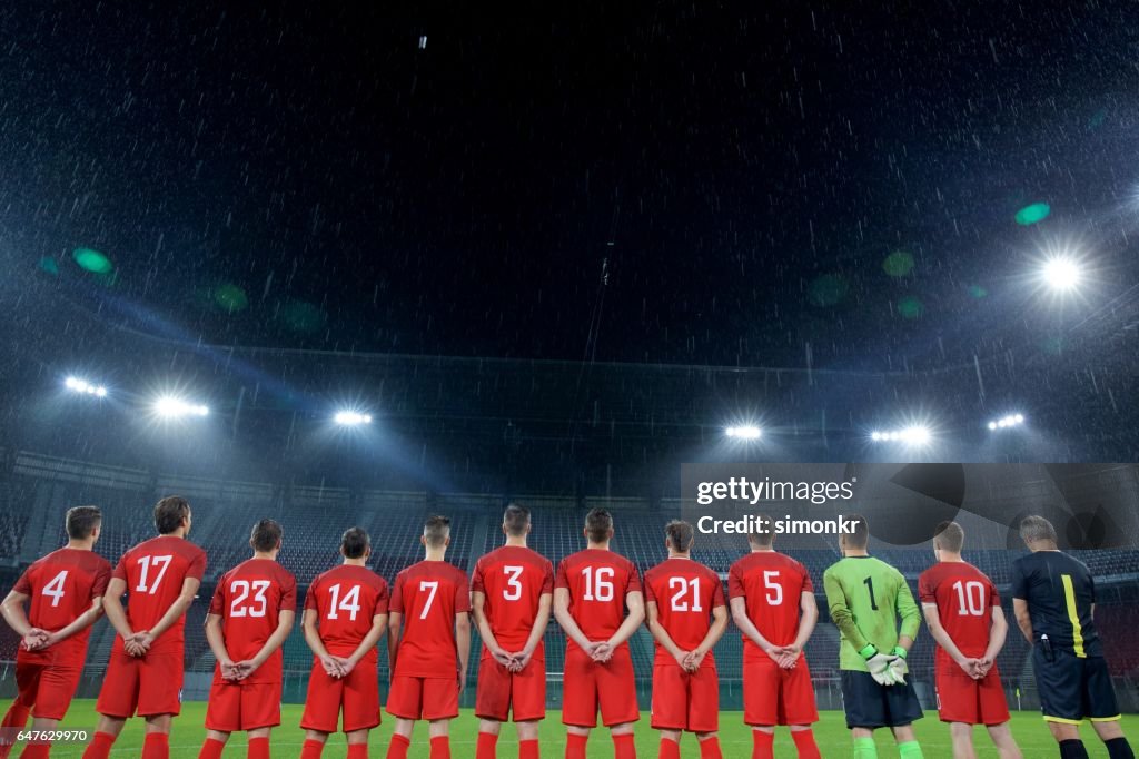 Pé de time de futebol em uma linha