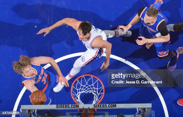 Ron Baker of the New York Knicks goes up for the layup against the Philadelphia 76ers at Wells Fargo Center on March 3, 2017 in Philadelphia,...
