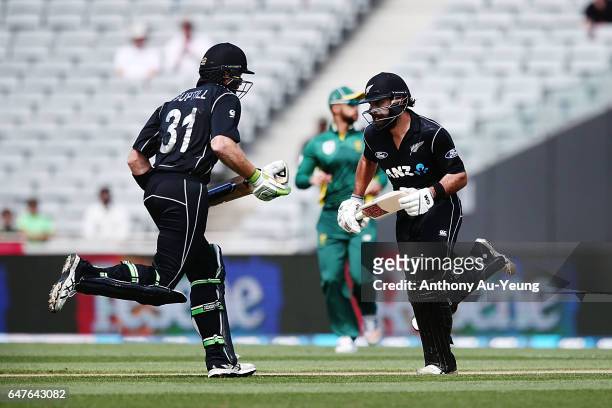 Dean Brownlie and Martin Guptill of New Zealand in their partnership during game five of the One Day International series between New Zealand and...