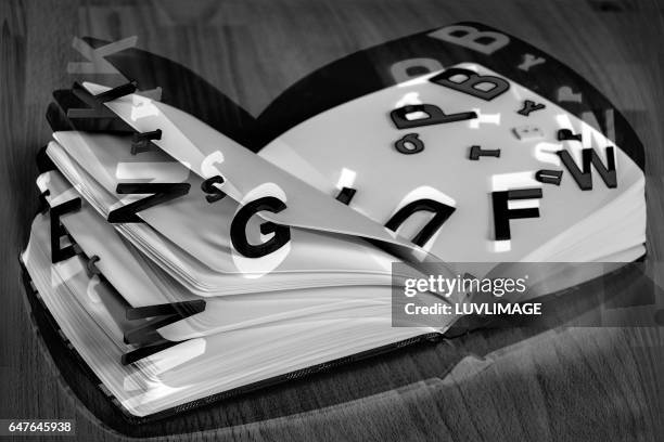 Float Book Lettering 123 Open Book Floating Stock Photos, High-Res Pictures, and Images ...