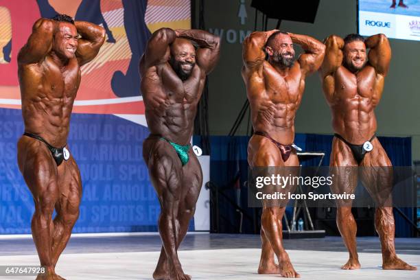 Hidetada Yamagishi , Charles Dixon , Guy Cisternino , and Zane Watson compete in the Arnold Classic 212 as part of the Arnold Sports Festival on...