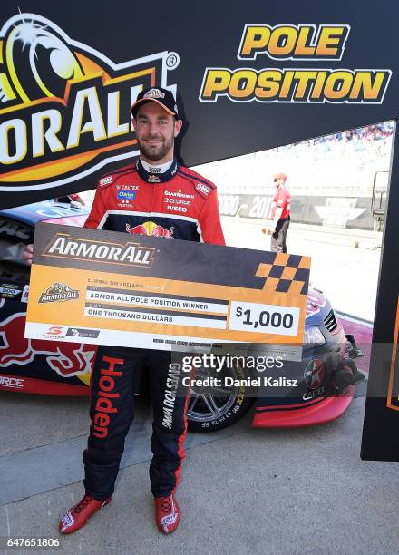 Shane Van Gisbergen driver of the Red Bull Holden Racing Team Holden Commodore VF reacts after taking pole position for race 1 of the Clipsal 500,...