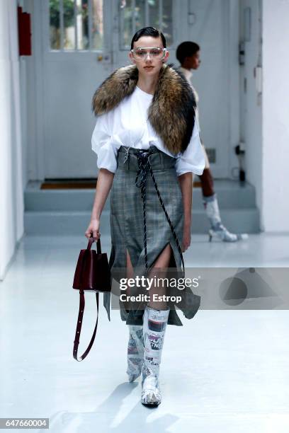 Model walks the runway during the Anne Sofie Madsen show as part of the Paris Fashion Week Womenswear Fall/Winter 2017/2018 on March 1, 2017 in...