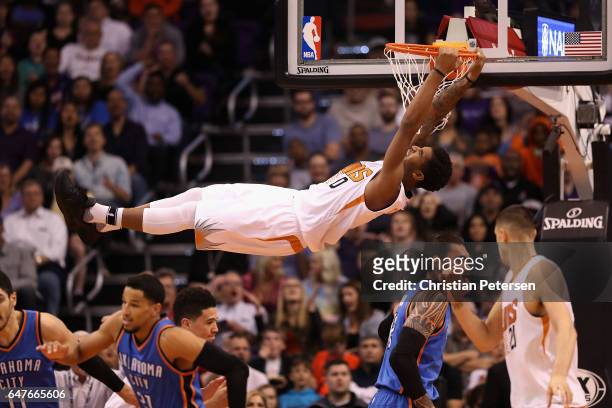 Marquese Chriss of the Phoenix Suns slam dunks the ball against the Oklahoma City Thunder during the first half of the NBA game at Talking Stick...
