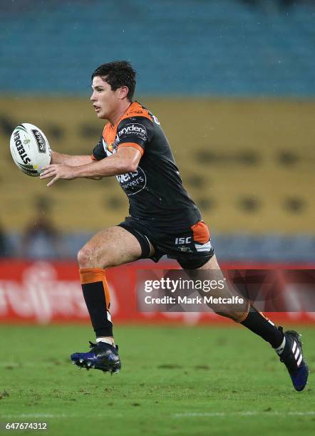 Mitch Moses of the Tigers in action during the round one NRL match between the South Sydney Rabbitohs and the Wests Tigers at ANZ Stadium on March 3,...