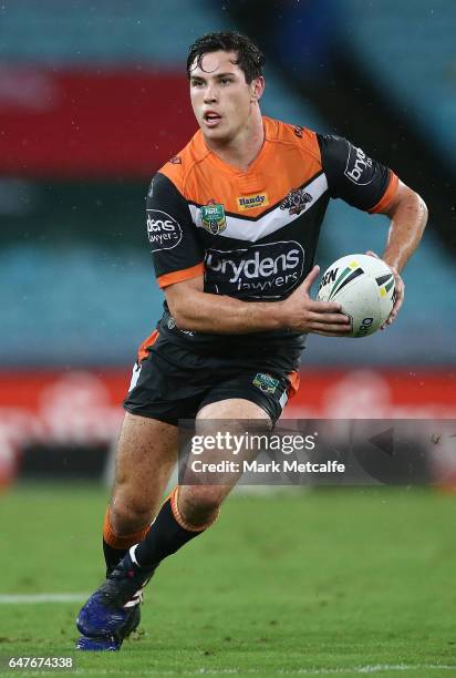 Mitch Moses of the Tigers in action during the round one NRL match between the South Sydney Rabbitohs and the Wests Tigers at ANZ Stadium on March 3,...