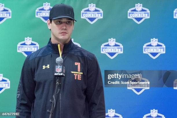 Louisville tight end Cole Hikutini answers questions to members of the press during the NFL Scouting Combine on March 3, 2017 at Lucas Oil Stadium in...