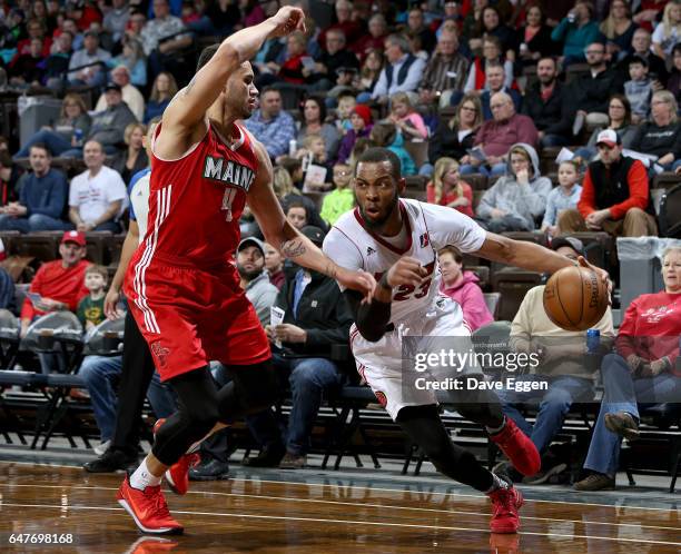 Jabril Trawick from the Sioux Falls Skyforce drives past Abdel Nader from the Maine Red Claws at the Sanford Pentagon March 3, 2017 in Sioux Falls,...