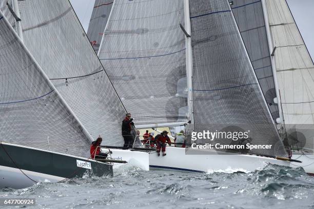 Competitors race in the Performance Class division during the Sydney Regatta in Sydney Harbour on March 4, 2017 in Sydney, Australia.