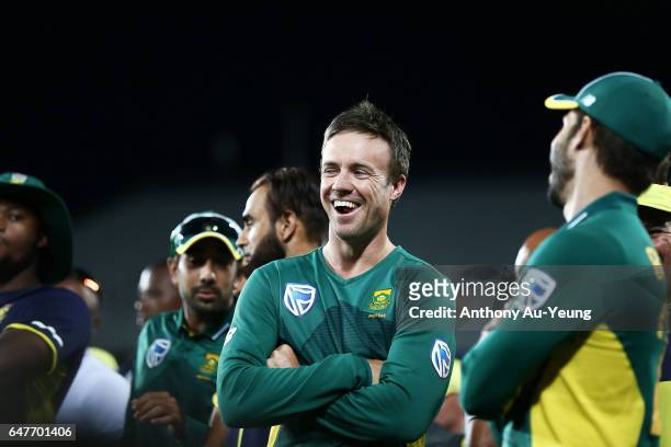 De Villiers of South Africa shares a laugh with teammates after winning game five of the One Day International series between New Zealand and South...