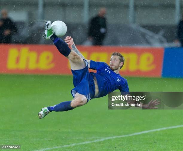 bicycle kick - bicycle kick stock pictures, royalty-free photos & images