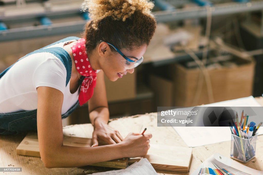 Latina Carpenter In Her Workshop